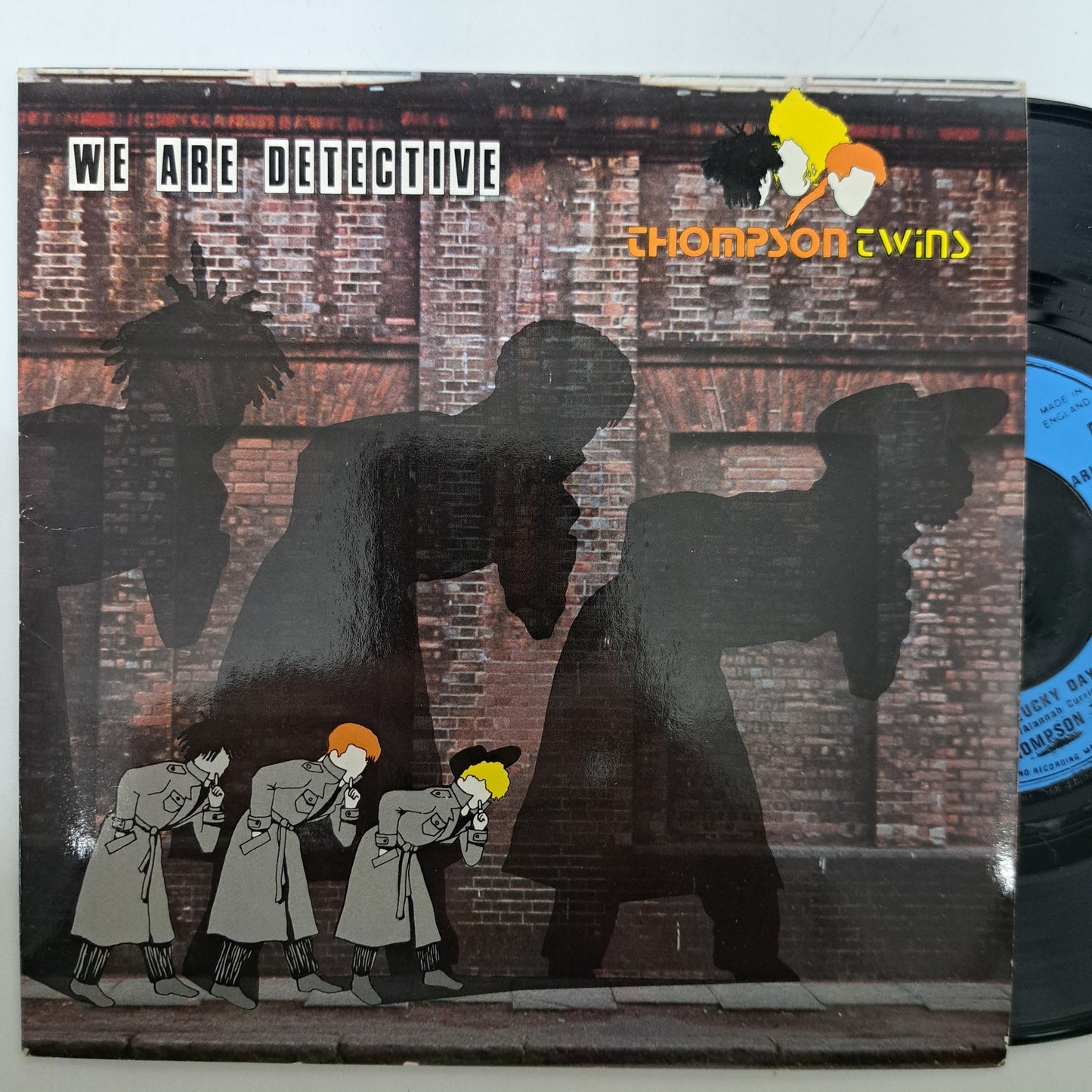 Thompson Twins - We are Detective (Vinyl 7" Single) NM/NM